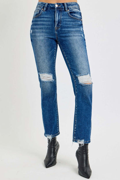 RISEN full size high rise distressed crop straight jeans styled with black ankle boots, showcasing chic and edgy fashion.