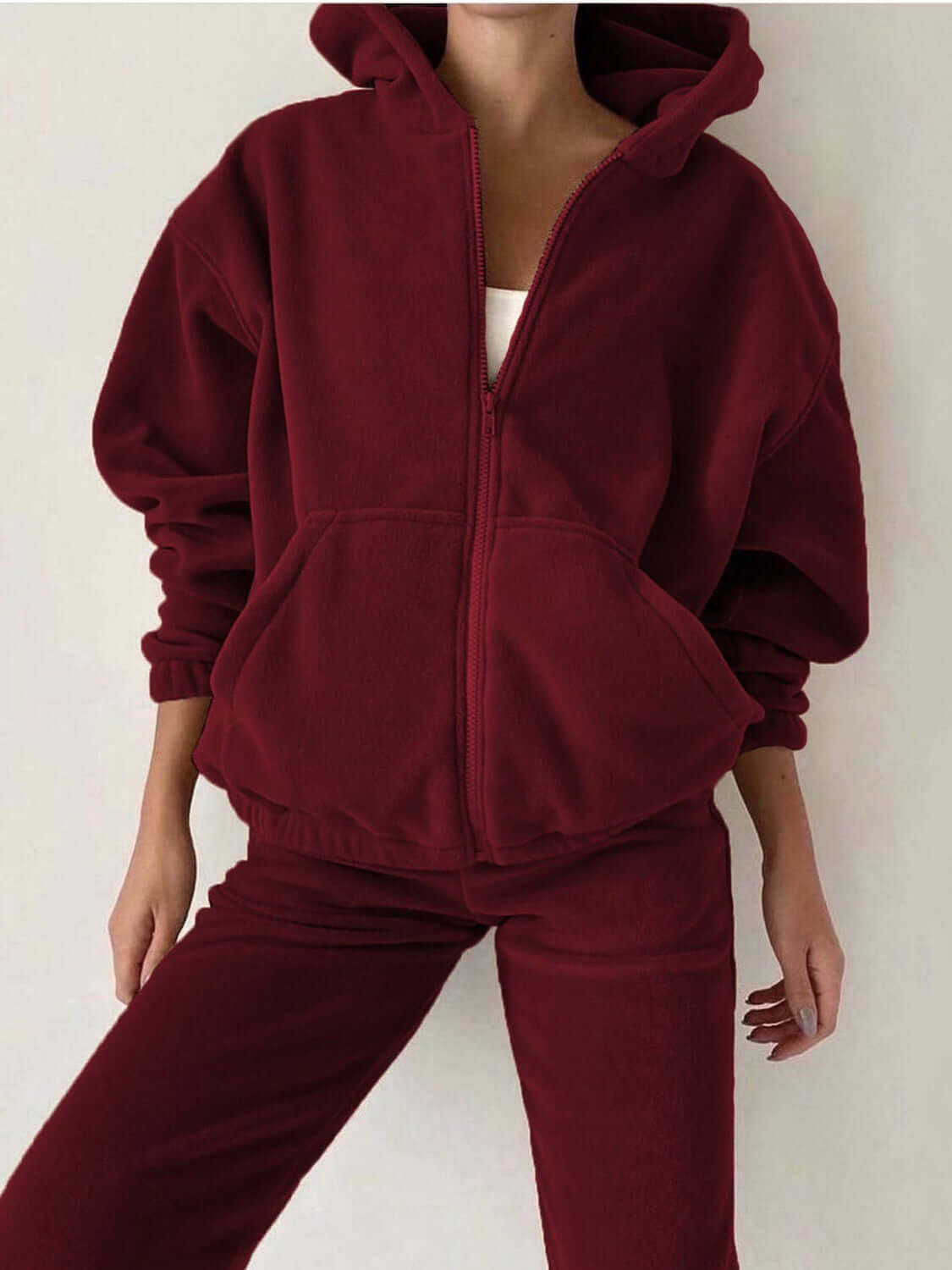 Cozy Bella Road burgundy zip-up hoodie and joggers set, perfect for fall outings or lounging, featuring pockets and a relaxed fit.