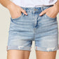 High-waist rolled denim shorts by Judy Blue Jeans with a stylish, flattering fit and casual rolled hem for a trendy summer look.