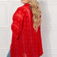 JUSTIN TAYLOR Pom-Pom Asymmetrical Poncho Cardigan in Red at Bella Road