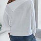 Woman wearing Bella Road Cable-Knit One Shoulder Long Sleeve Sweater in white, showcasing back view and unique one-shoulder design.