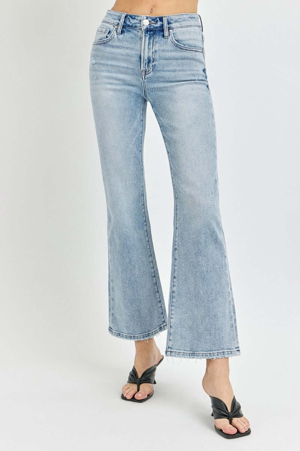 RISEN Full Size High Rise Ankle Flare Jeans in light blue with flared hem and high-waisted fit for a vintage and modern look