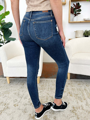 Woman wearing Classic Handsand Skinny Jeans displaying a flattering fit with a hand-sanded finish for a vintage look.