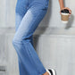 Bella Road Denim Straight Leg Jeans with pockets, medium wash, styled with sneakers and coffee cup in hand.