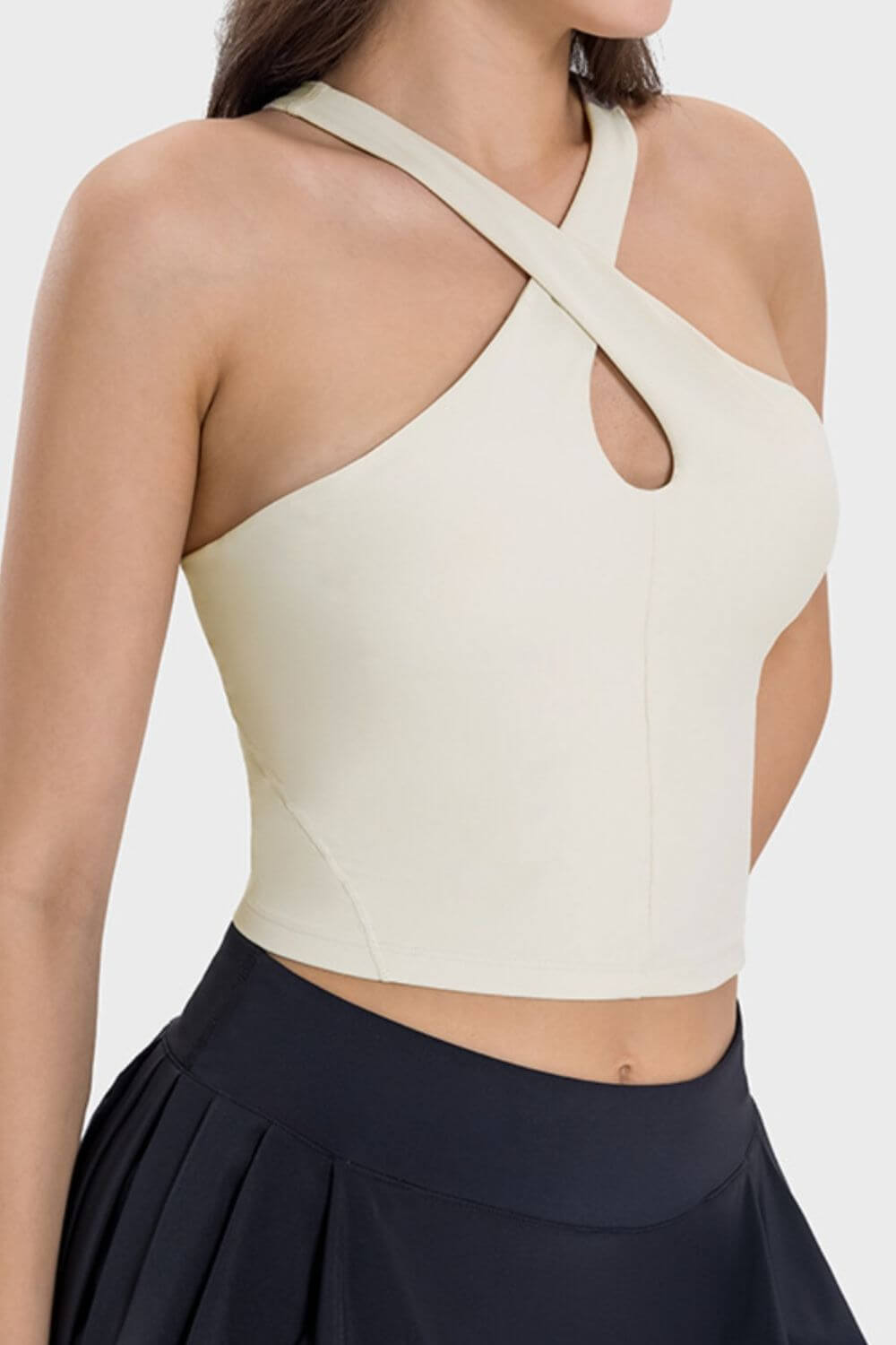 Stylish Millennia Crisscross Grecian Neck Active Cami in light color, perfect for gym workouts and staying cool.