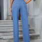 Back view of Bella Road Denim Straight Leg Jeans, showcasing pockets and a stylish medium wash on a model.