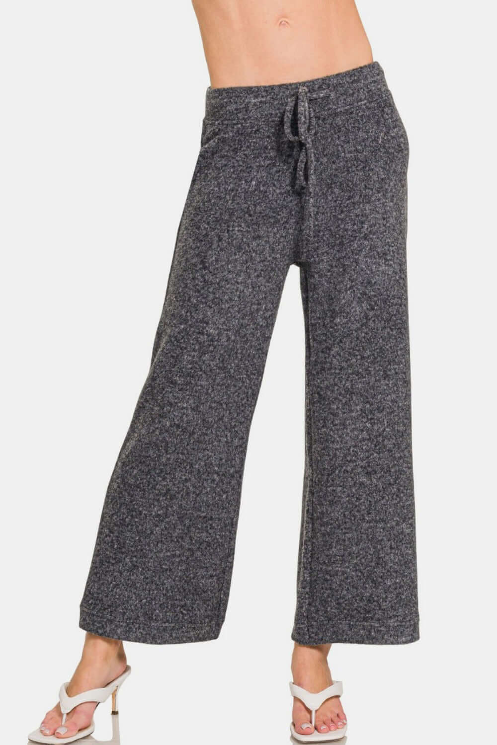 Zenana Hacci cropped pants with drawstring waist and pockets, perfect for a casual and comfy style in soft, cozy fabric.