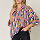 DOUBLE TAKE Full Size Geometric Notched Raglan Sleeve Blouse at Bella Road