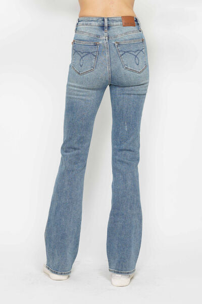 Back view of Judy Blue plus size tummy control bootcut jeans with embroidered pockets for a stylish look.