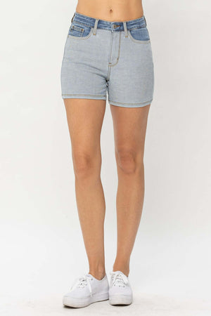 Woman wearing Judy Blue Jeans color block denim shorts for summer casual fashion