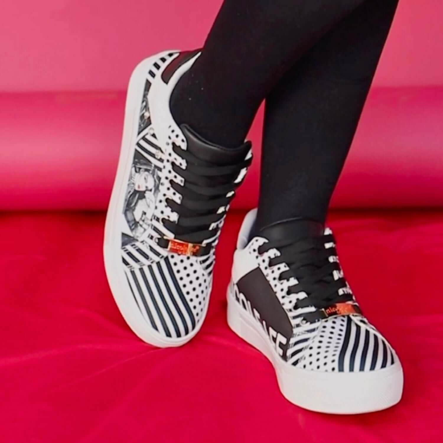 Nicole Lee USA Printed Vegan Leather Lace Up Sneaker with trendy design and lace-up closure for a chic and sustainable footwear option.