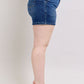 Side view of Judy Blue plus size double button denim shorts showcasing high-waisted fit and stylish design.