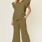 Woman wearing olive Texture Ruffle Short Sleeve Top and Drawstring Wide Leg Pants Set with pockets.