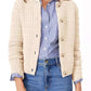 Woman wearing Bella Road button-up round neck long sleeve cardigan over blue striped shirt and jeans.