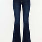 Kancan high-rise slim flare jeans in deep stone wash for a chic and polished look, styled with heels and a fitted top.