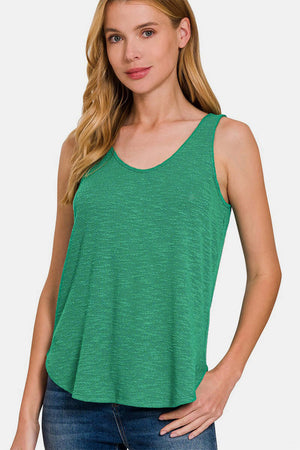 Woman wearing green Curved Hem Round Neck Tank with denim shorts, perfect for a casual and chic summer look.