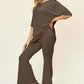 DOUBLE TAKE Full Size Round Neck Drop Shoulder T-Shirt and Flare Pants Set at Bella Road