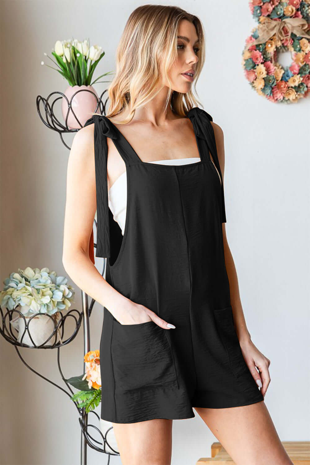 HEIMISH Full Size Sleeveless Romper with Pockets at Bella Road