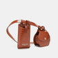 Nicole Lee USA 2 Piece Texture Belt Bag with removable phone case and messenger pouches in pebbled vegan leather.