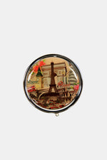 Nicole Lee USA print metallic circular large pill case with Paris landmarks design