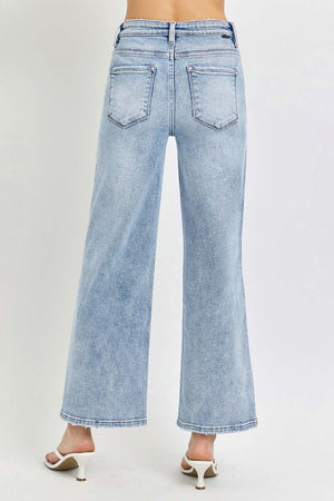 Back view of RISEN Full Size Tummy Control High Rise Crop Wide Leg Jeans in light wash.