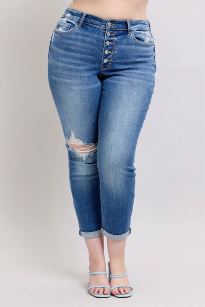 Stylish Judy Blue plus size button fly distressed jeans with pockets and slight stretch, perfect for casual outings.