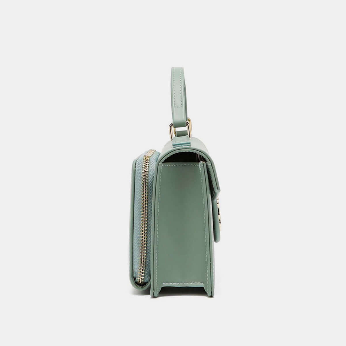 Side view of Nicole Lee USA Small Crossbody Wallet in green vegan leather with multiple compartments and detachable strap.