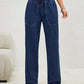 Woman wearing Bella Road Drawstring Elastic Waist Jeans with Pockets dü