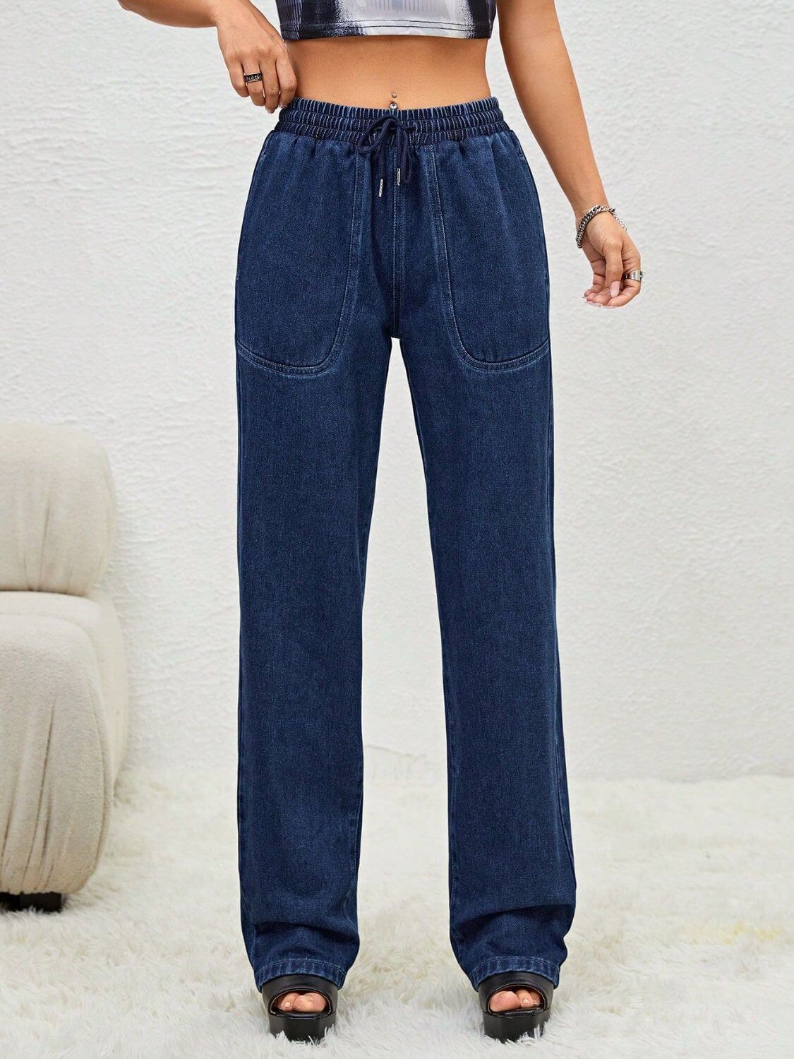 Woman wearing Bella Road Drawstring Elastic Waist Jeans with Pockets dü