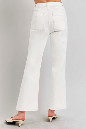 Flattering high-rise ankle flare jeans with patch pockets in white, offering a chic retro vibe and functional style.