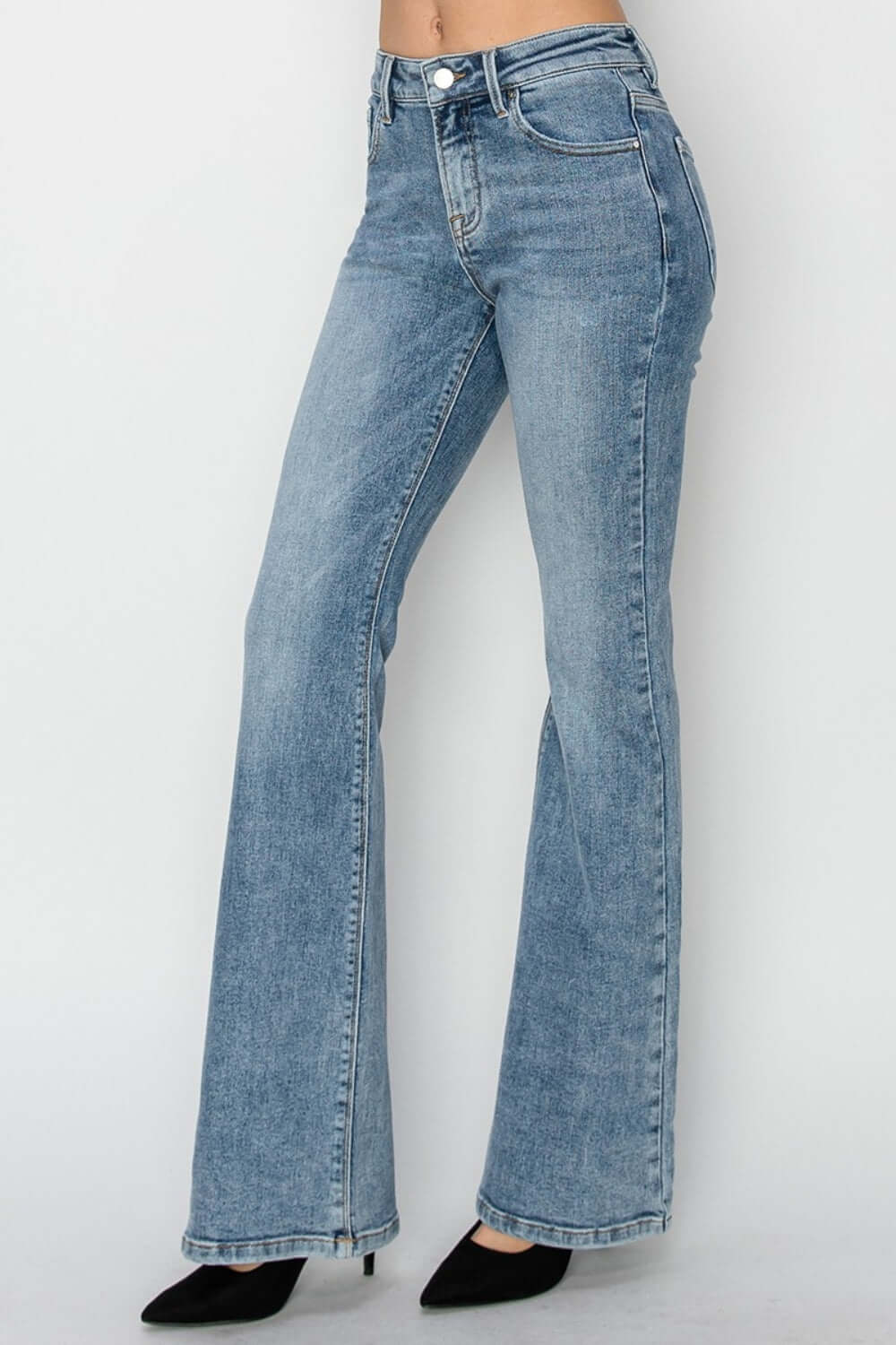 Mid-rise bootcut jeans by Risen Jeans - love the comfy fit, trendy flared hem, and versatile style for any occasion.