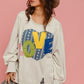 Cozy BiBi LOVE Heart Patch Slit Sweatshirt with colorful heart patch, perfect for casual, stylish outfits.