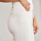 Side view of Mini Mia Full Size Tummy Control High Waist Raw Hem Jeans showcasing the pocket and original hem design in comfortable denim