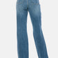 Judy Blue high-waist jeans with raw hem, showcasing back view and sleek silhouette, perfect for versatile styling.