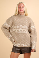 Woman wearing a cozy Christmas element mock neck long sleeve sweater with festive pattern, perfect for holiday warmth and style.