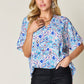 DOUBLE TAKE Full Size Printed V-Neck Short Sleeve Blouse at Bella Road