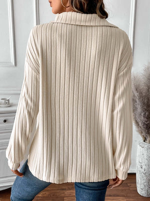 Woman wearing Ribbed Johnny Collar Long Sleeve T-Shirt in cream color, showing back detail.