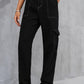 Woman wearing Baeful Long Straight Leg Jeans with Pockets in solid black, featuring a casual chic style and comfortable fit.