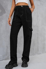 Woman wearing Baeful Long Straight Leg Jeans with Pockets in solid black, featuring a casual chic style and comfortable fit.