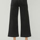 Back view of RISEN high rise wide leg ankle jeans for plus size, showcasing stylish cropped length and trendy silhouette.