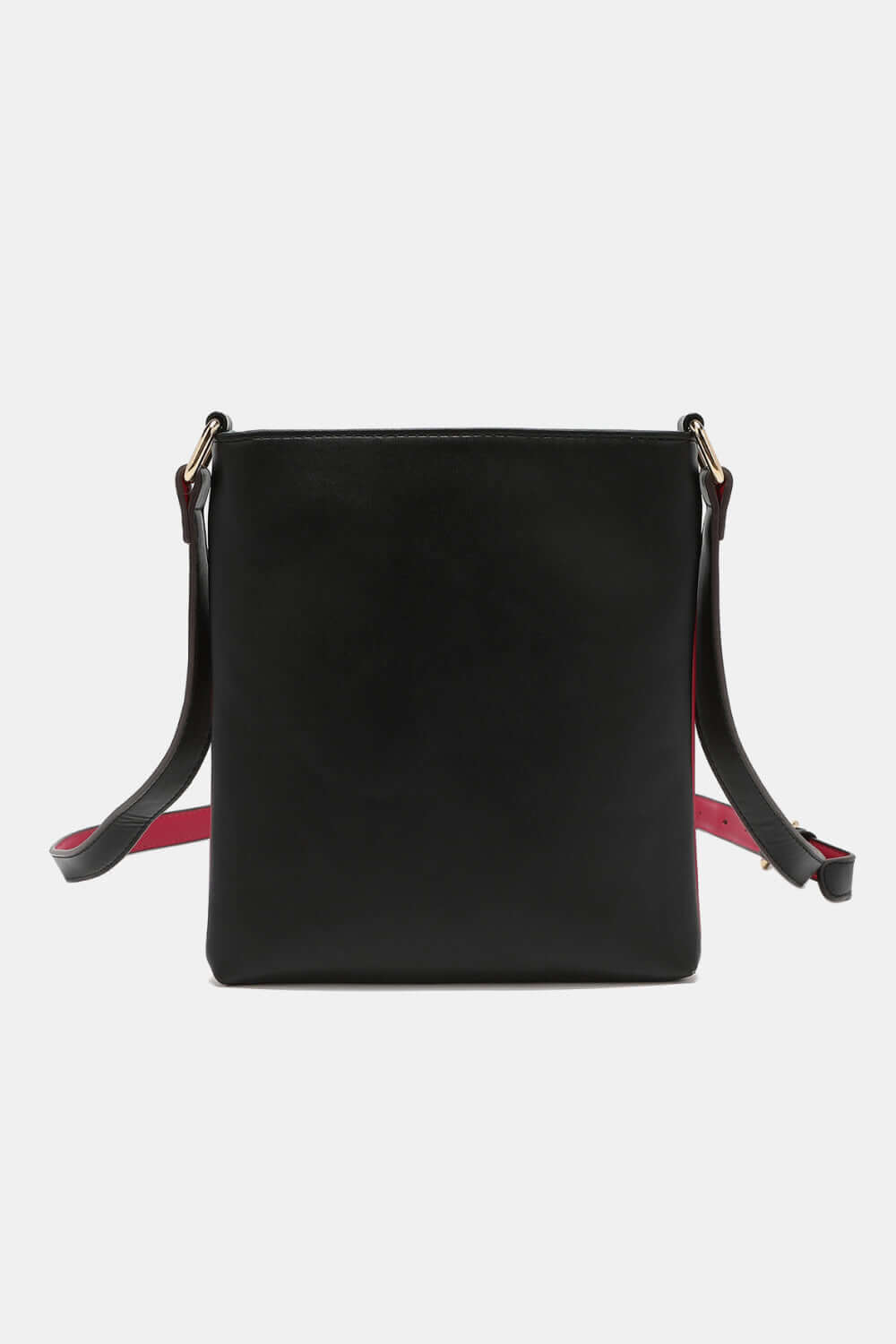 Nicole Lee USA Nikky Crossbody Bag in smooth eco-leather, showcasing slimline design and adjustable straps with main zipper closure.