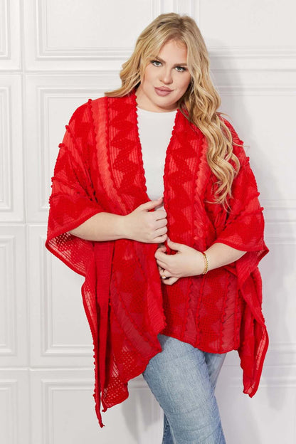 JUSTIN TAYLOR Pom-Pom Asymmetrical Poncho Cardigan in Red at Bella Road