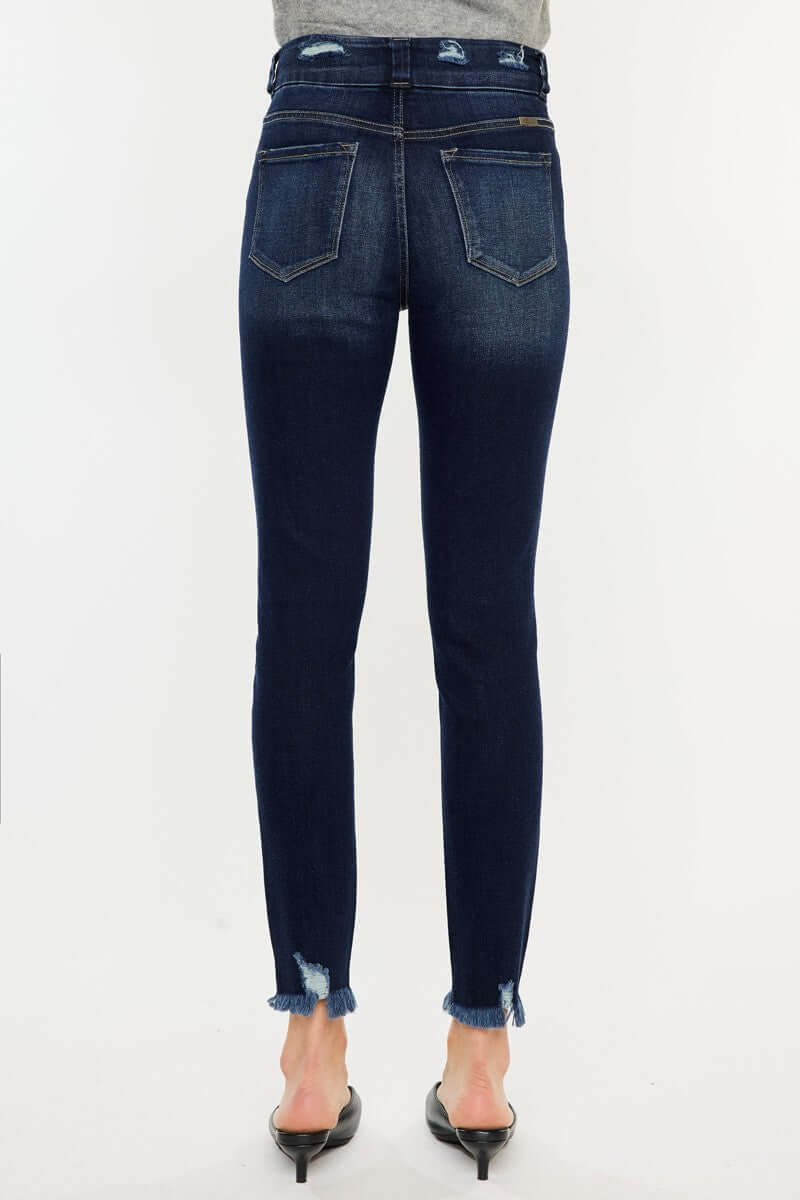 Women's Cat's Whiskers Raw Hem High Waist Jeans, back view, showing dark denim and edgy raw hem finish. Perfect for a vintage-modern look.