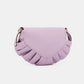 Lilac Nicole Lee USA graphic crossbody bag with ruffled design and adjustable strap for hands-free carrying