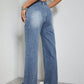 Woman wearing Bella Road High Rise Wide Leg Jeans with Pockets, featuring slightly stretchy denim, and casual style.