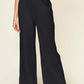 DOUBLE TAKE Full Size Texture Smocked Waist Wide Leg Pants at Bella Road