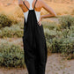 DOUBLE TAKE Full Size V-Neck Sleeveless Jumpsuit with Pockets at Bella Road