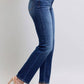 Judy Blue washed straight leg jeans with pockets, stylishly paired with heels for a trendy everyday look.