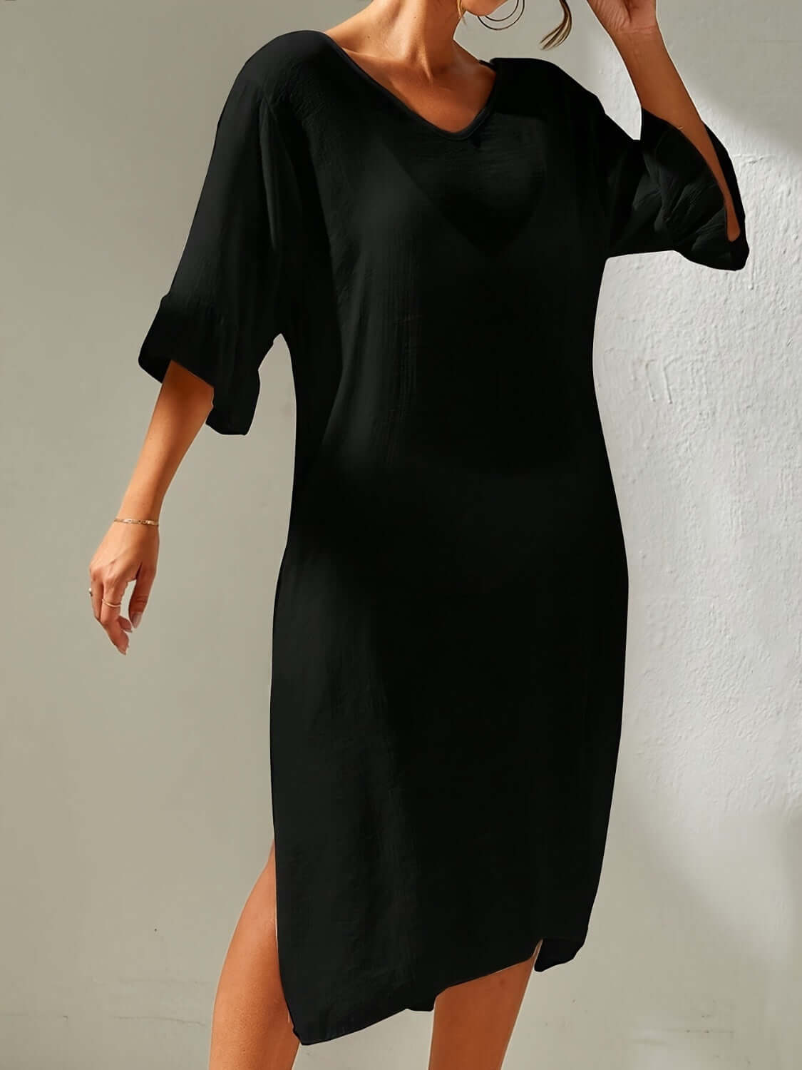 Black slit V-neck flounce sleeve cover-up dress with backless design and tied sheer fabric, perfect beachwear, 100% polyester.