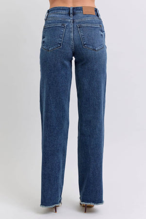 Back view of Judy Blue full size raw hem mid-rise jeans showcasing a trendy frayed edge and flattering fit.